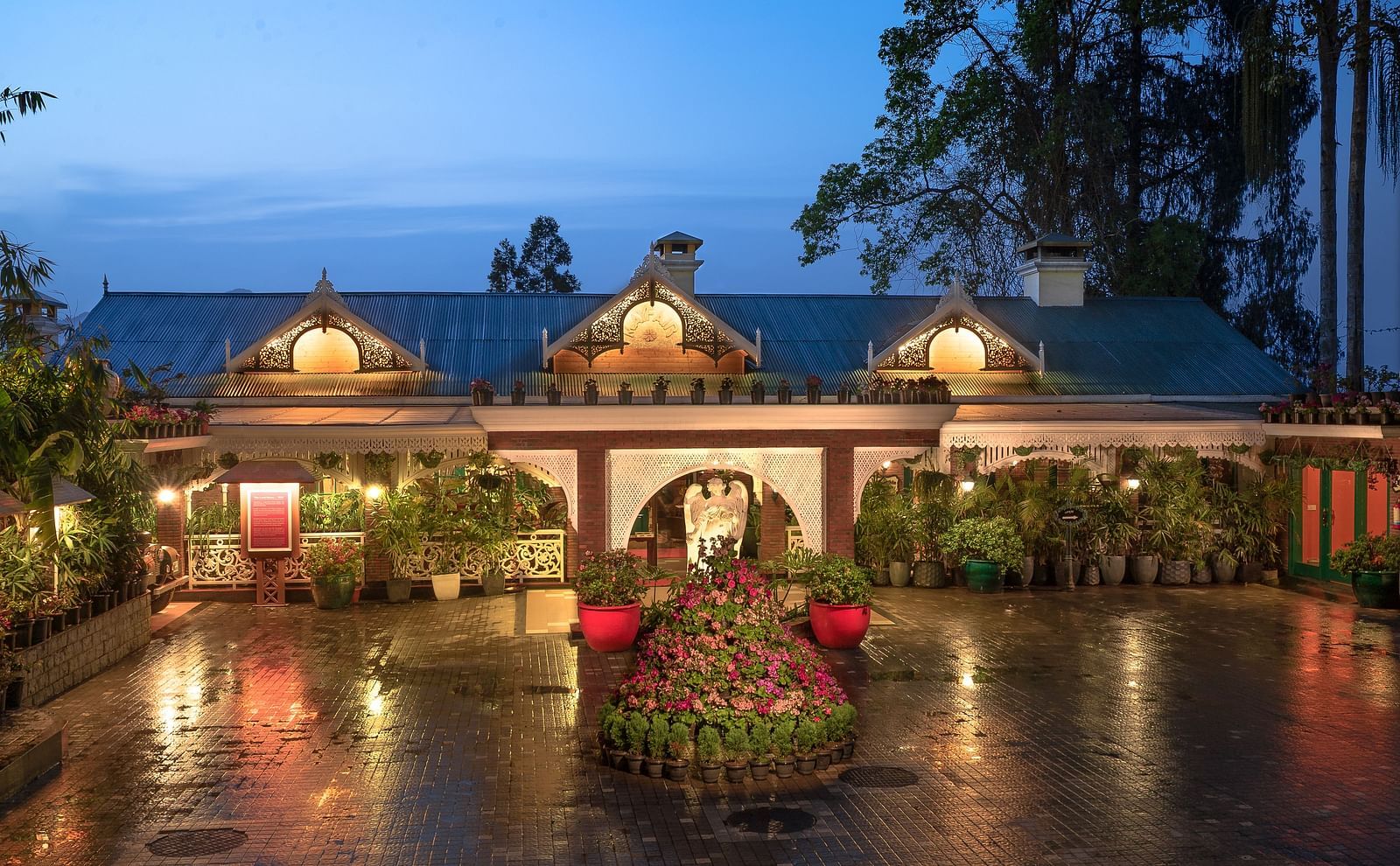 view of the entrance space of the resort at night time - Mayfair Himalayan Spa Resort Kalimpong