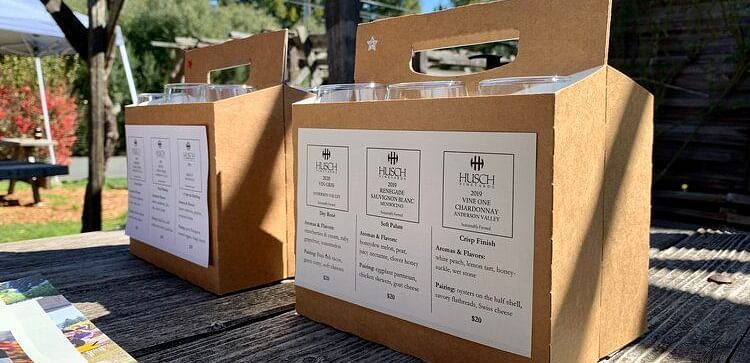 An image of a packet where glasses are placed and the packaging is labelled as Husch
