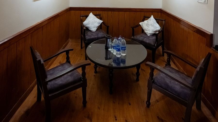 Sitting area with 2 chairs at The Pavilion, Nainital