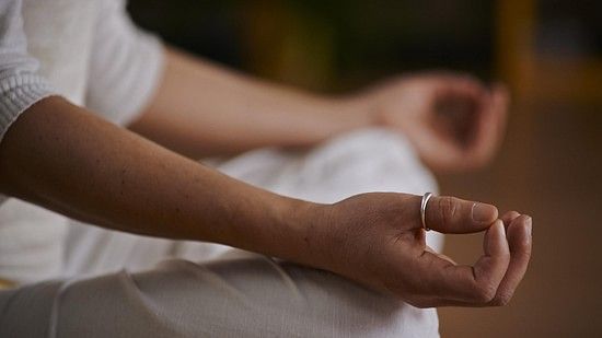 a woman meditating 
