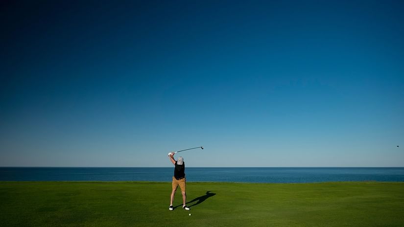 a man playing golf