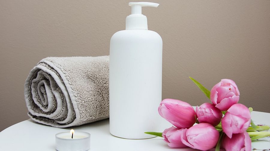 An image with body care related items indicating a spa