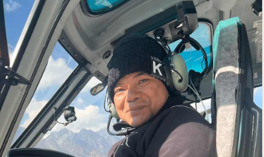 An image of a man inside the helicopter | Kavya Resort and Spa, Nagarkot