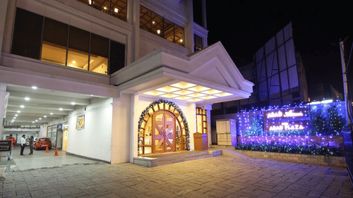 facade of business-class 3-star hotel in Ernakulam - Abad Plaza, MG Road, Shenoy Kochi - Staycation Kochi