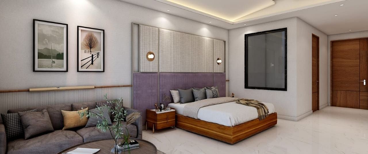 A spacious room featuring a double bed alongside a common seating area. - Namaste Corbett