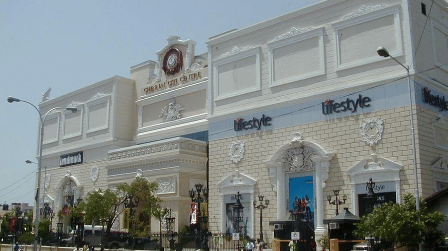 A facade view of Chennai City Centre Mall with the road in front of it