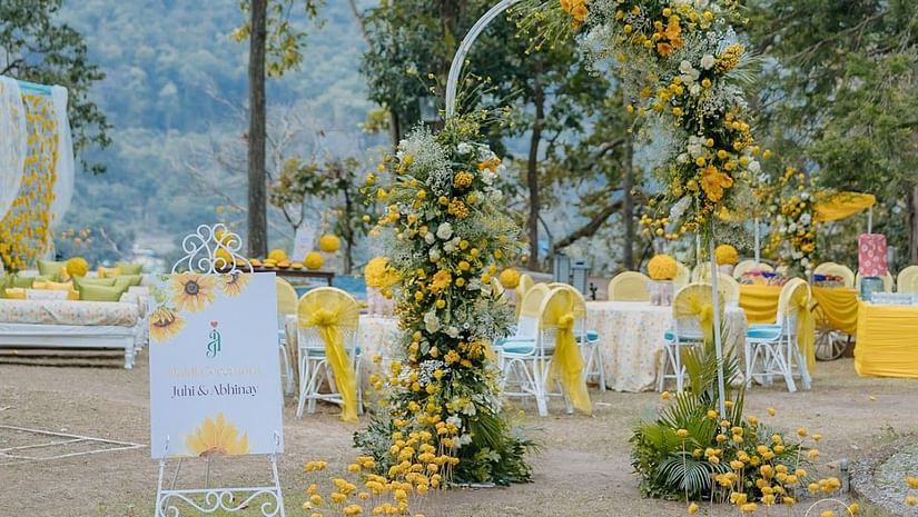 Lush garden venue setup for an outdoor wedding ceremony