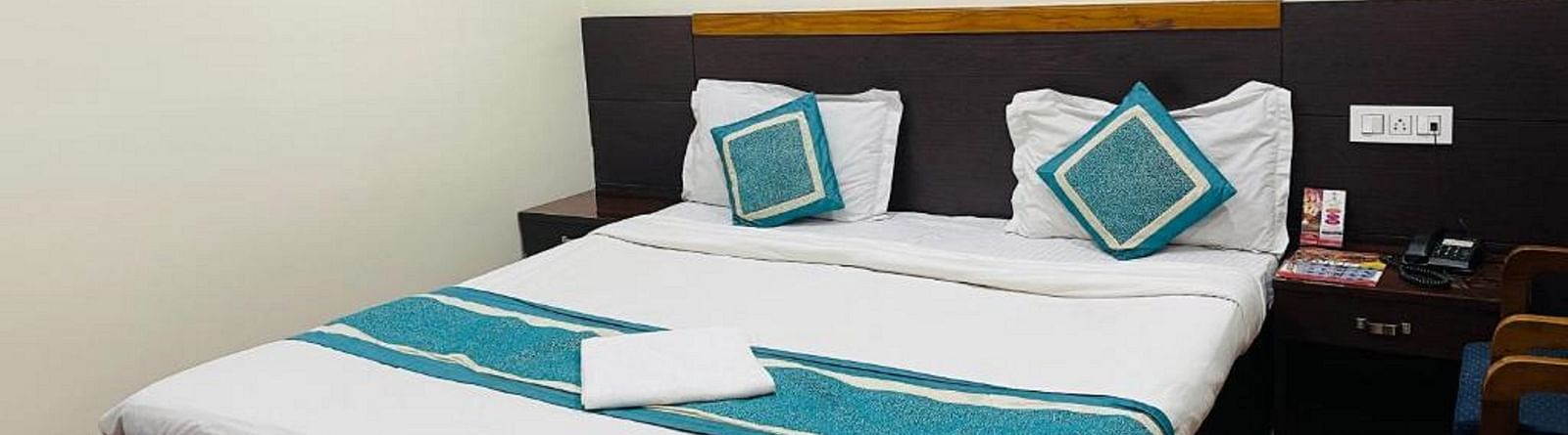 Queen Size Bed in Premium Room in Ecotel Vinayak