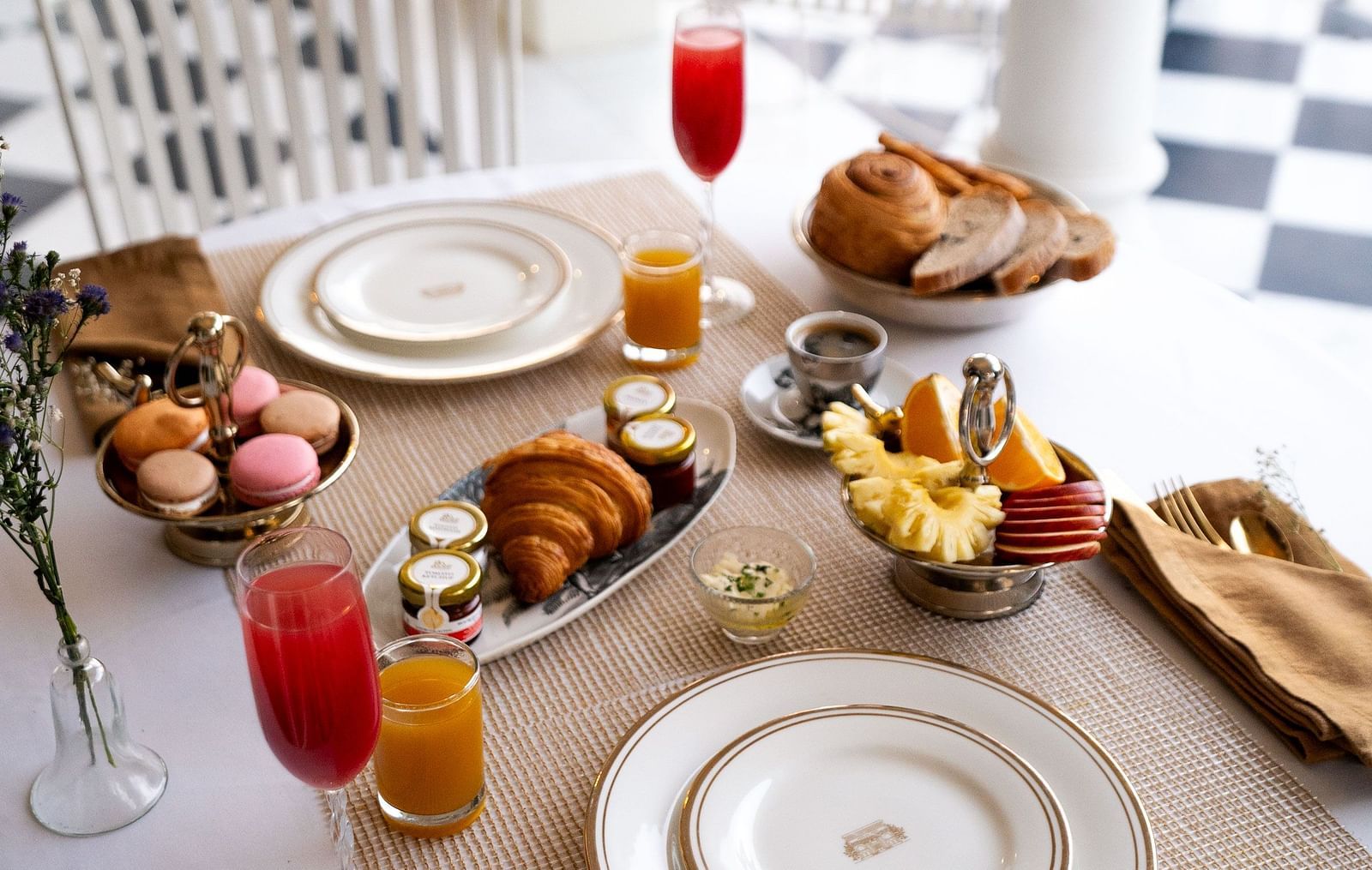 A breakfast table arrangement in the outdoor patio area of Dileep Kothi, Jaipur