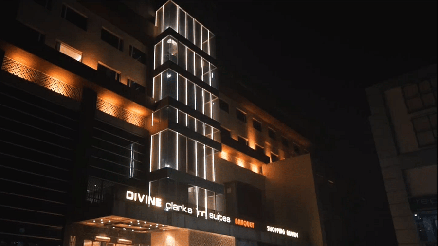 Facade of Divine Clarks Inn Suites