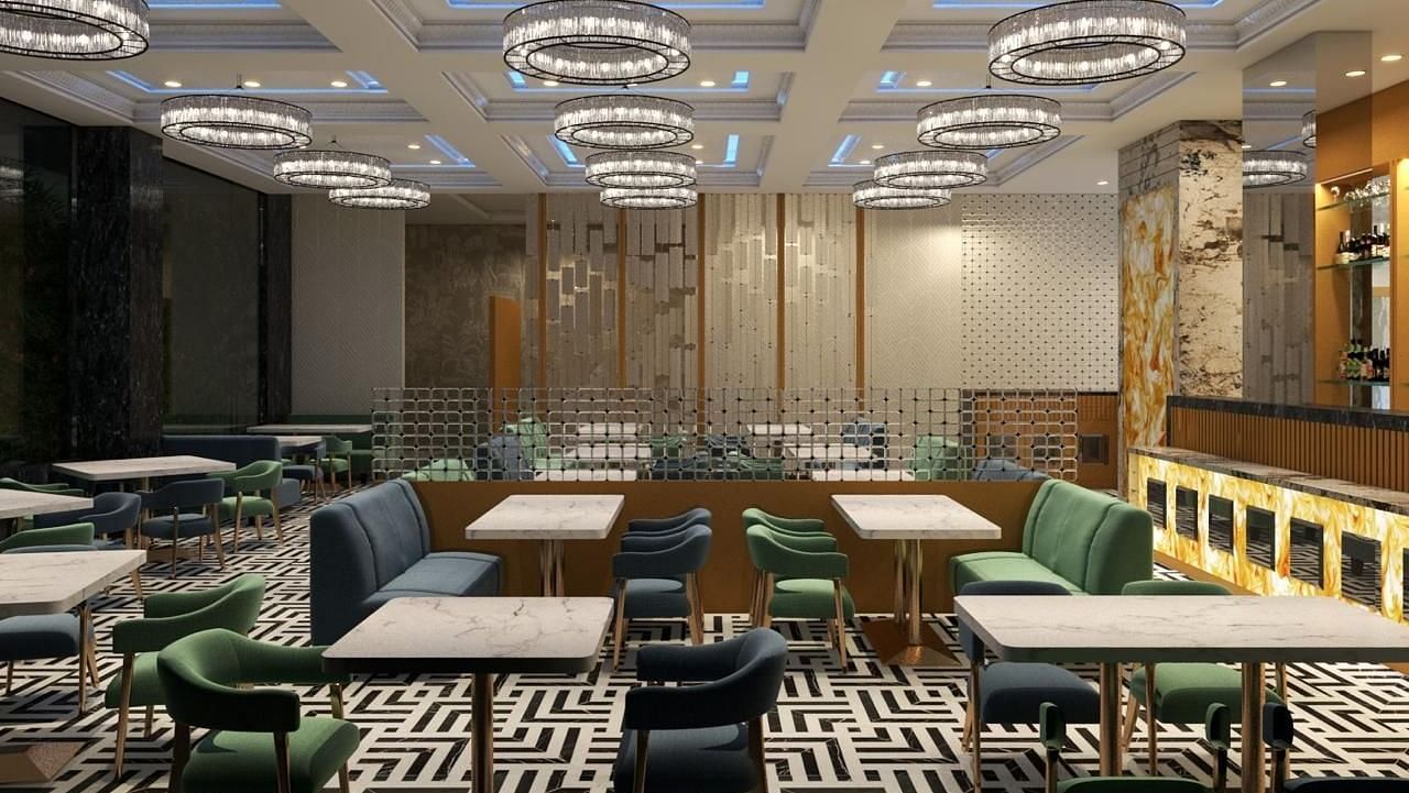 A stylish restaurant featuring chairs and tables, with round fancy lights at Hotel Mumbai House, Vashi