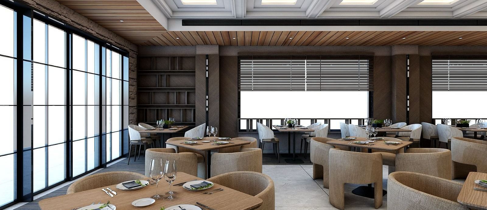 Dining tables placed besides the huge windows emitting plenty of natural light from outside - Namaste Corbett 