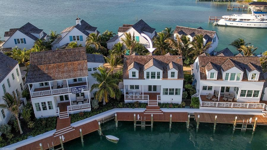 Aerial view of luxurious waterfront houses with private docs at Abaco Inn.