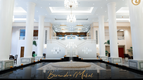 Luxurious hotel lobby with white marble interiors and grand chandeliers having the Best Places to Eat in Lucknow at Clarks Avadh, Lucknow.