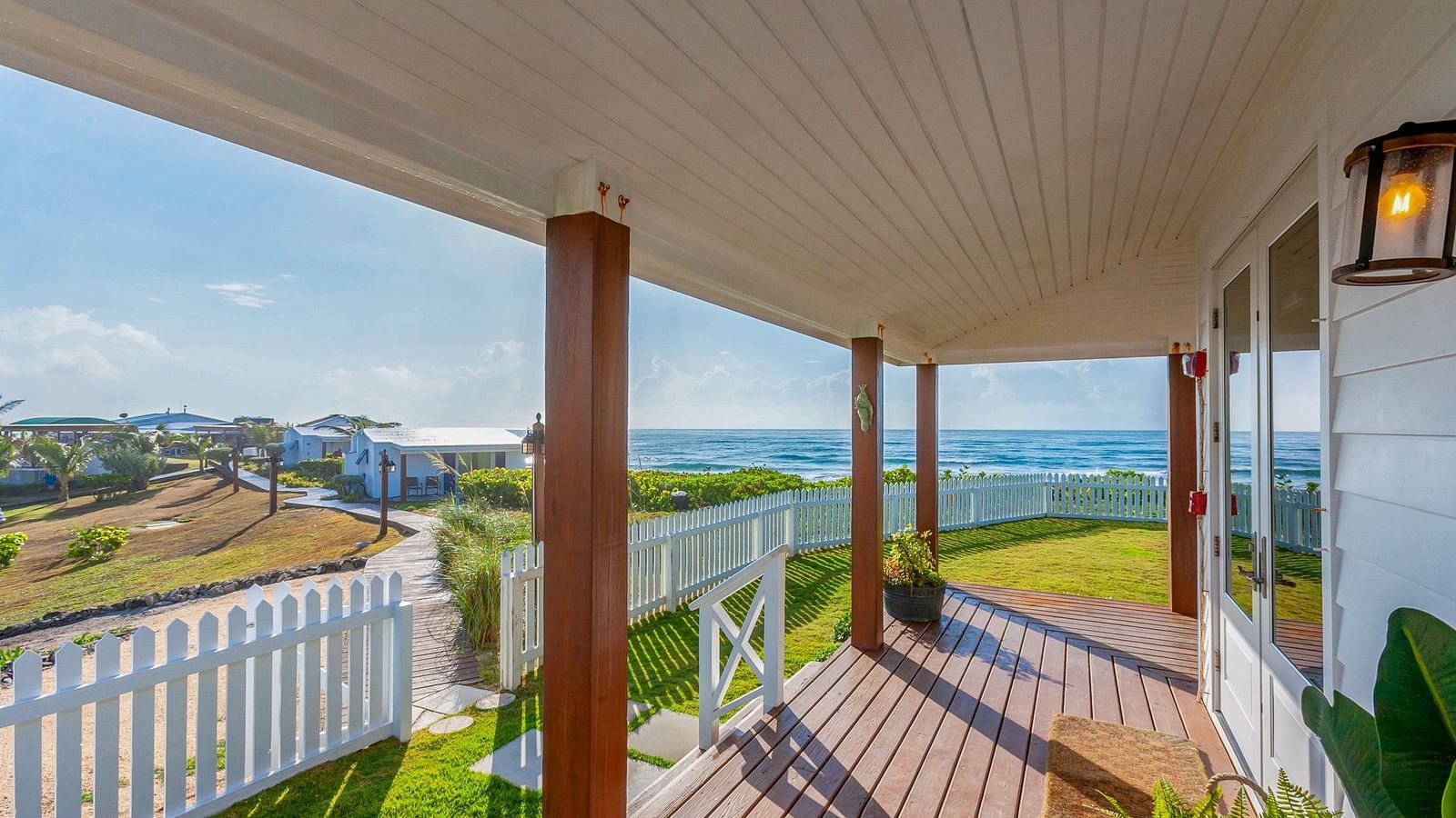 View from the porch of Hill Top Cottage at Abaco Inn overlooking the landscape.