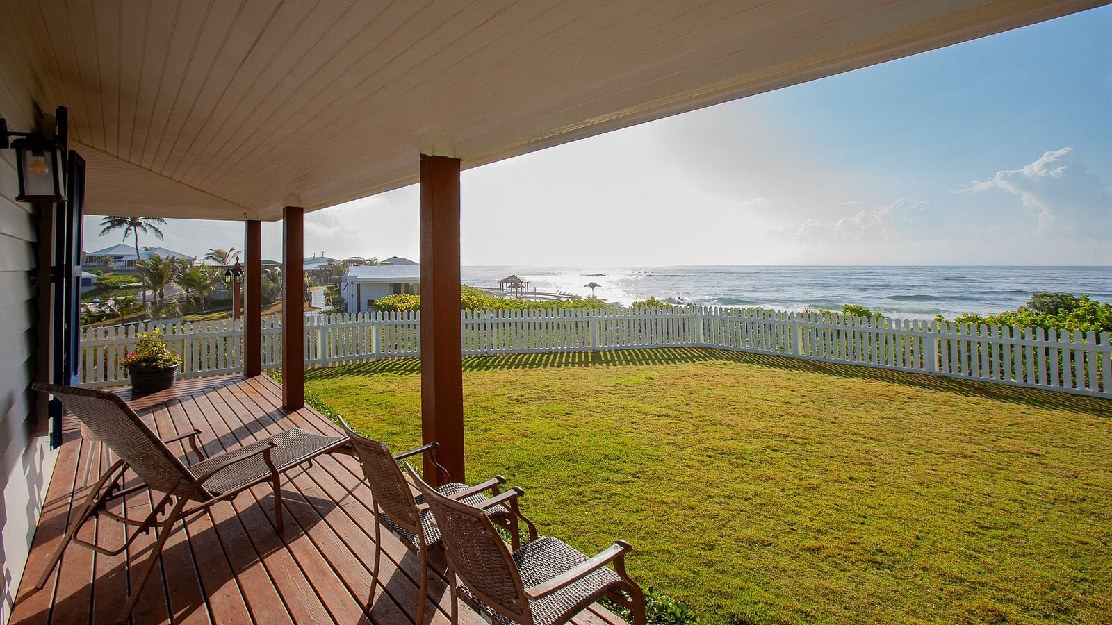 Veranda view from Hill Top Cottage at Abaco Inn overlooking the scenic landscape.