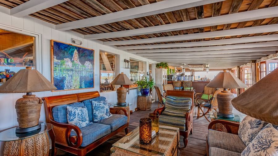 Cozy seating area with couches and vibrant decor | Abaco Inn