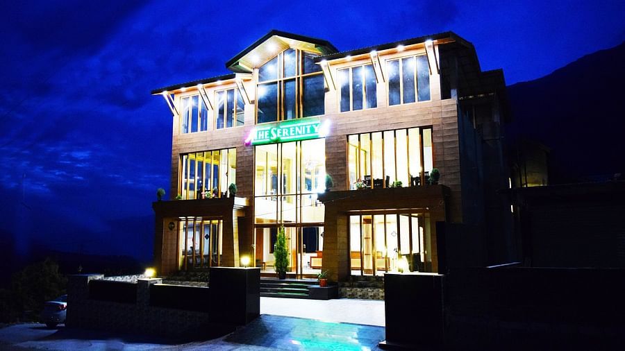 Shot of the hotel facade during the night  | DLS Serenity Resort and Spa