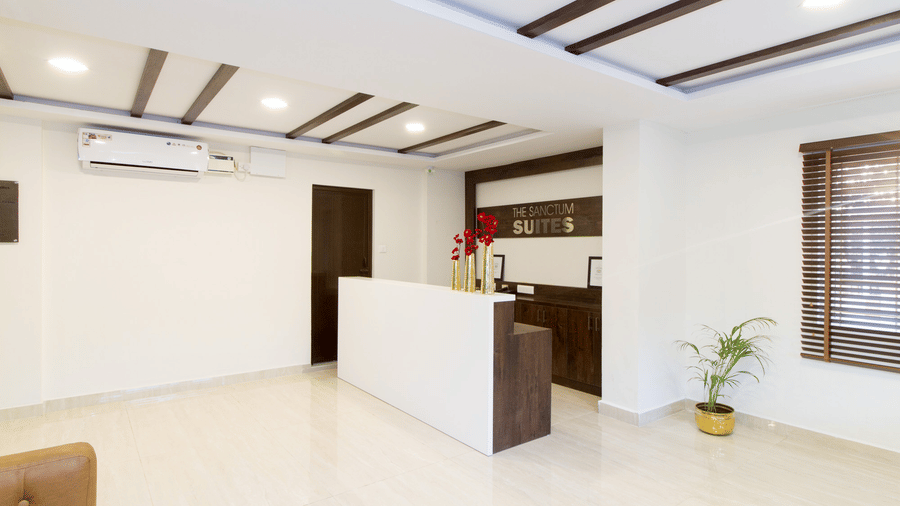 Welcoming reception and lobby area at Sanctum Suites Whitefield, Bangalore.
