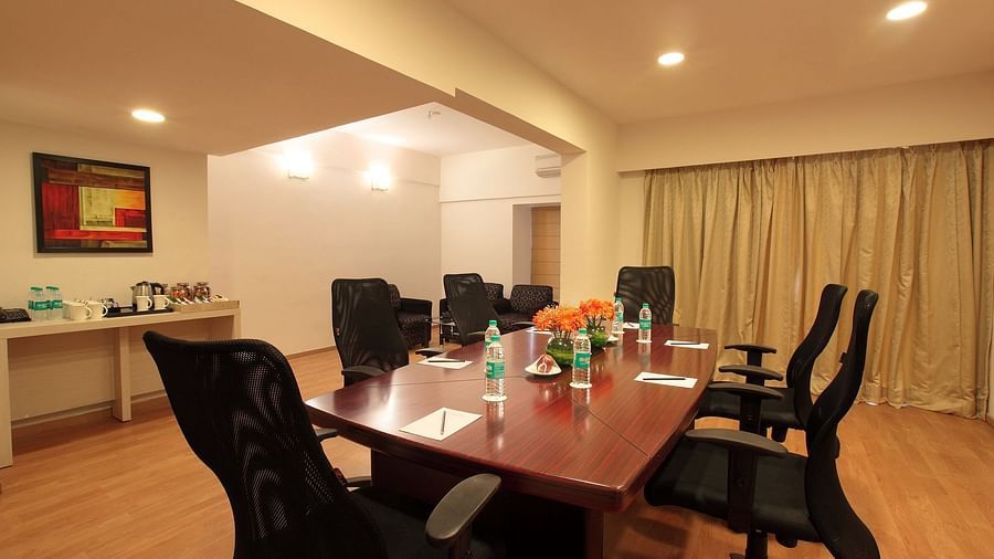 Seating arrangement in the boardroom at Starlit Suites, Bangalore