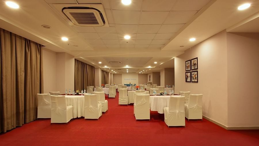 Seating arrangement in the banquet hall at Starlit Suites, Bangalore