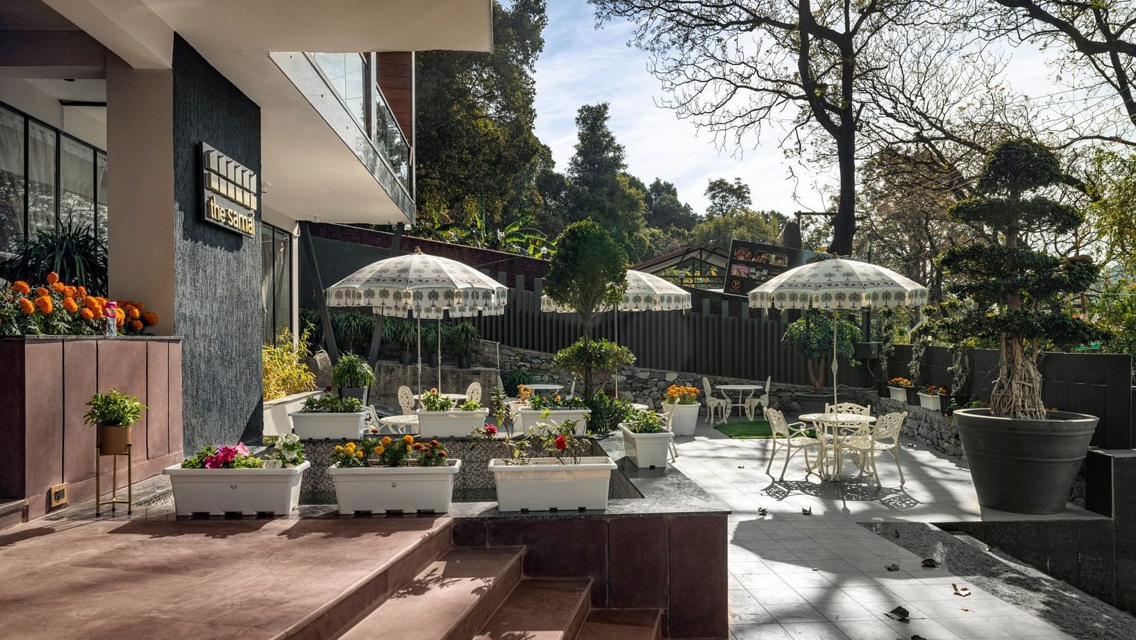 A view of the outdoor seating arrangement of the restaurant at our hotel - The Samai, Bhimtal