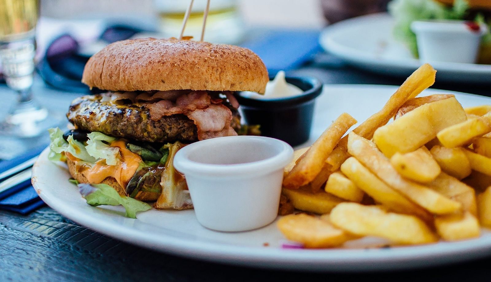 burger and fries served on a plate