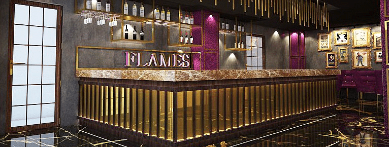 A Luxurious bar interior with a black and gold theme  - TGI Grand Fortuna, Hosur