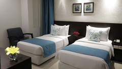 Deluxe Room Rockland Hotel Chittaranjan Park New Delhi Hotel in CR Park 2