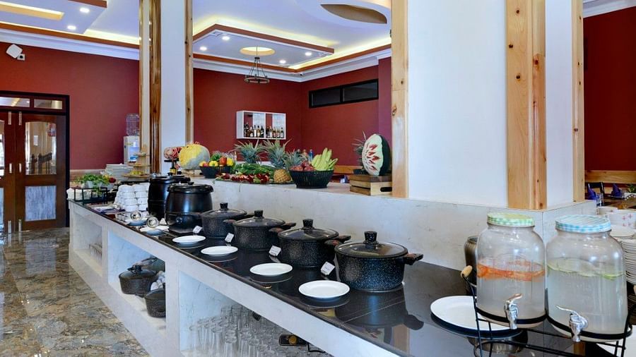 An image of the restaurant area where a buffet table is set up - Yashshree Sikkim Blossom, Gangtok