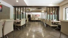 An overview of the seating arrangements inside the restaurant - VITS Shalimar, Ankleshwar.