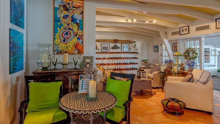 A bright and inviting place with tropical decor, comfortable seating, and vibrant artwork | Abaco Inn