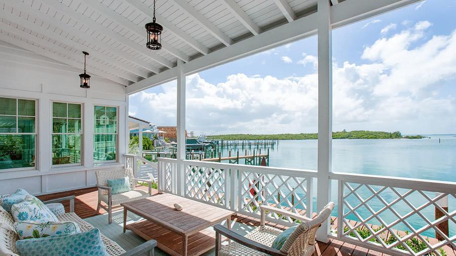 Covered outdoor lounge with a view of the ocean | Abaco Inn