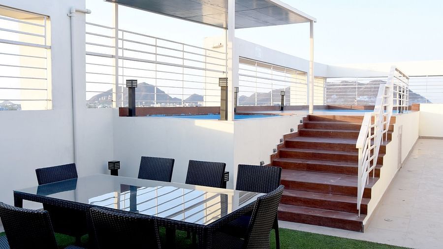Seating arrangement below the jacuzzi - Starlit Suites, Neemrana