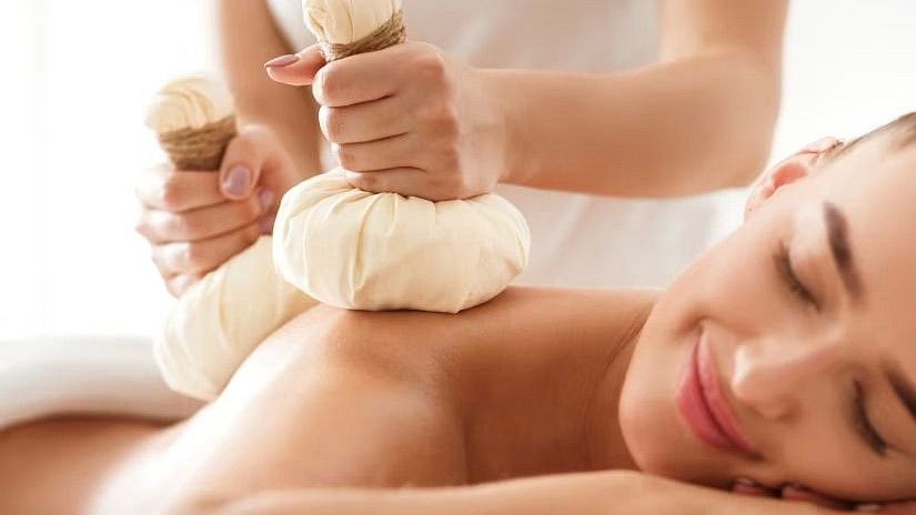 Invigorating Ayurvedic massage with herbal compress at YO1 Health Resort, Catskills, New York.