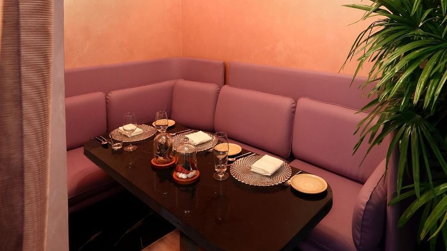 The Empresa Boutique Hotel - a corner sofa seat at White Charcoal restaurant in Andheri