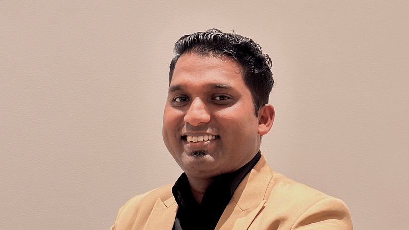 A potrait image of a  person posing for a picture