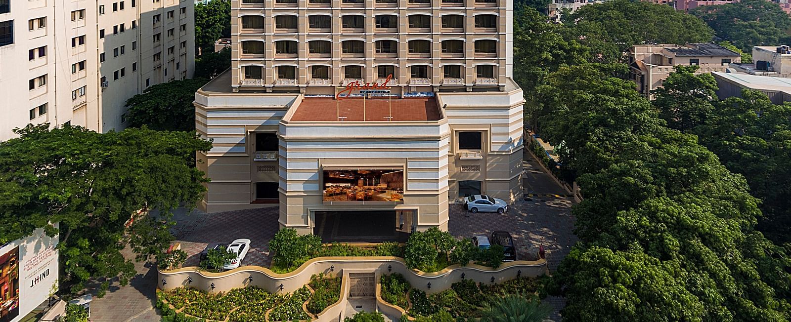 Facade view of Grand Chennai By GRT Hotels during day time.