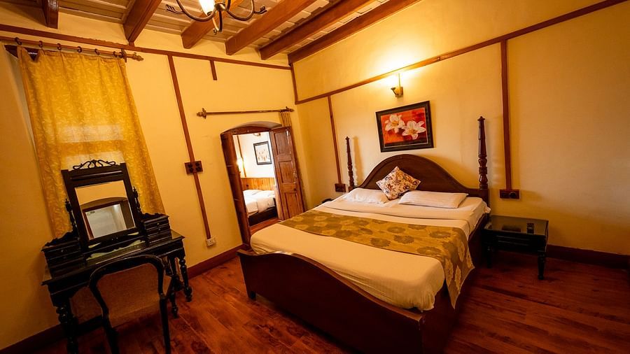 Spacious Heritage Family Suite with a cosy bed and lighting at Himalaya Hotel, Nainital