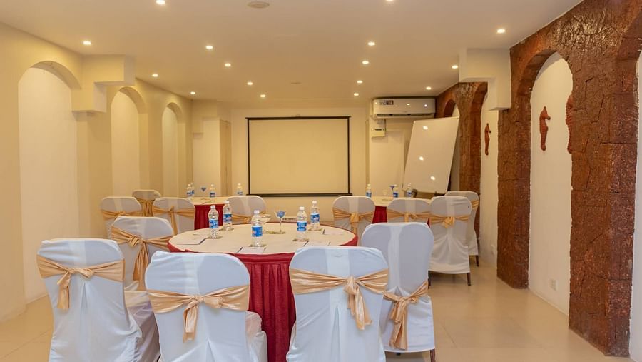 Round table seating at Opera Banquet Hall at Kyriad Prestige Calangute, Goa