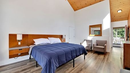 A view of a room at Amador Hotel with a double bed.