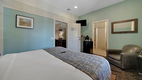 A view of a room at The Groveland Hotel with a double bed.