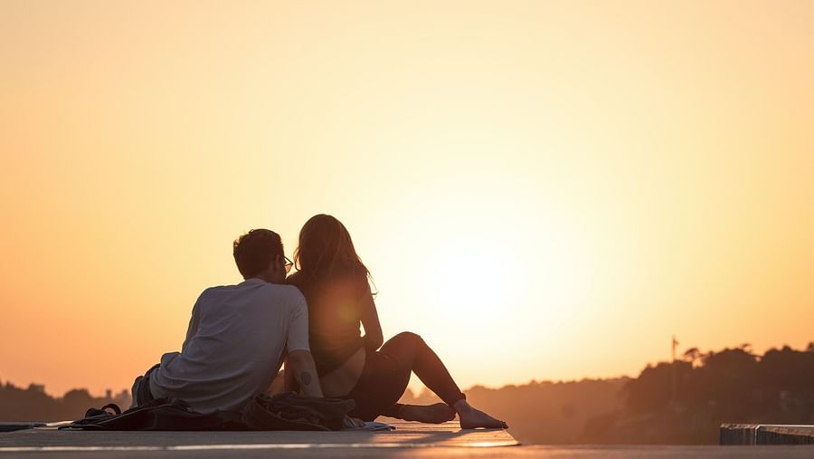 Couple relishing the sunset