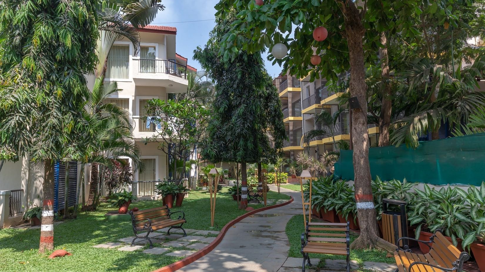 View of a beautiful lane surrounded by trees at Kyriad Prestige Calangute, Goa