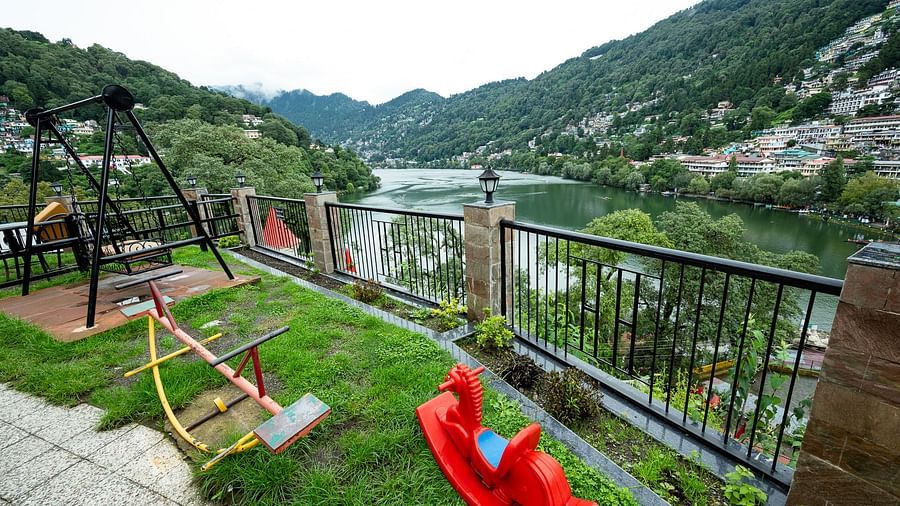 Kids play area with toys and a river view at Himalaya Hotel, Nainital