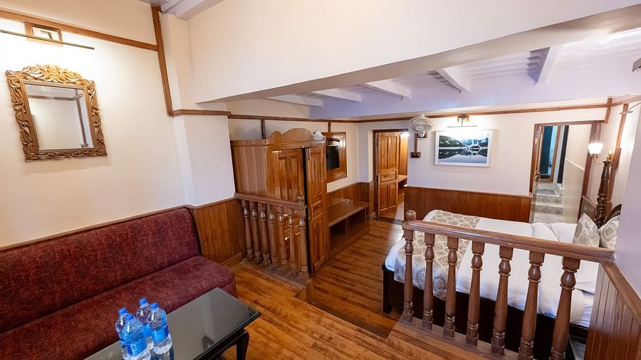A quiet, relaxing corner in the Heritage Family Suite room at Himalaya Hotel, Nainital