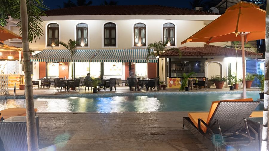 Swimming Pool at Kyriad Prestige Calangute, Goa at night