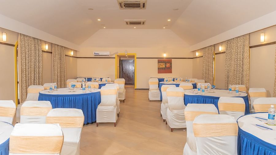 Round table seating at Opera Banquet Hall at Kyriad Prestige Calangute, Goa