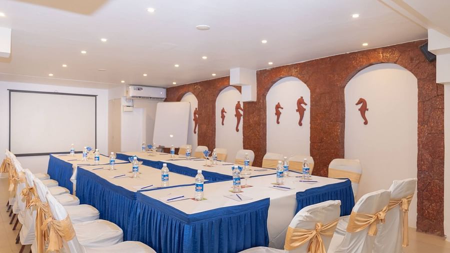 Chairs set in a U-shaped seating at Opera Banquet Hall at Kyriad Prestige Calangute, Goa