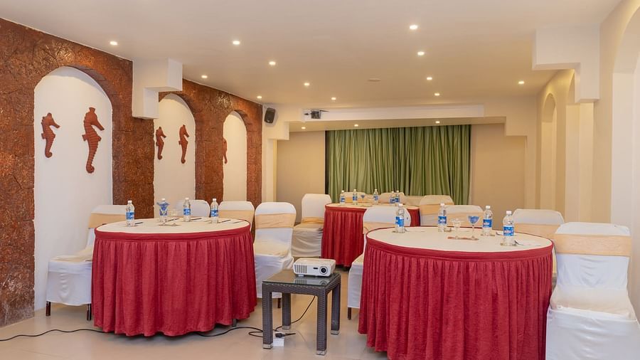 Round table seating at Opera Banquet Hall at Kyriad Prestige Calangute, Goa